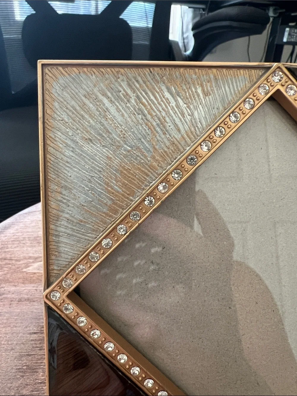 Z Gallerie picture frame features an enamel and crystal-decorated diamond border
